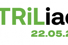Nowoczesne logo wydarzenia o nazwie „TRIliada”. Słowo „TRIliada” zapisane jest dużą, pogrubioną czcionką – litery „TRI” mają intensywny, jaskrawozielony kolor (lime green), natomiast część „liada” jest w kolorze czarnym. Pod nazwą znajduje się data wydarzenia: „22.05.2025”, również w jaskrawozielonym kolorze. Całość utrzymana jest w czystym i nowoczesnym stylu graficznym.